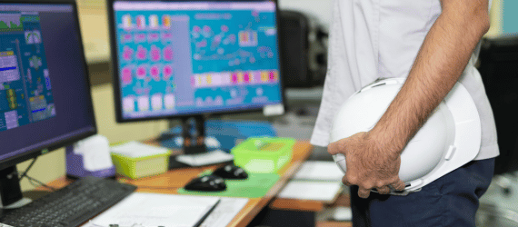 Automation Engineer in Front of Computer